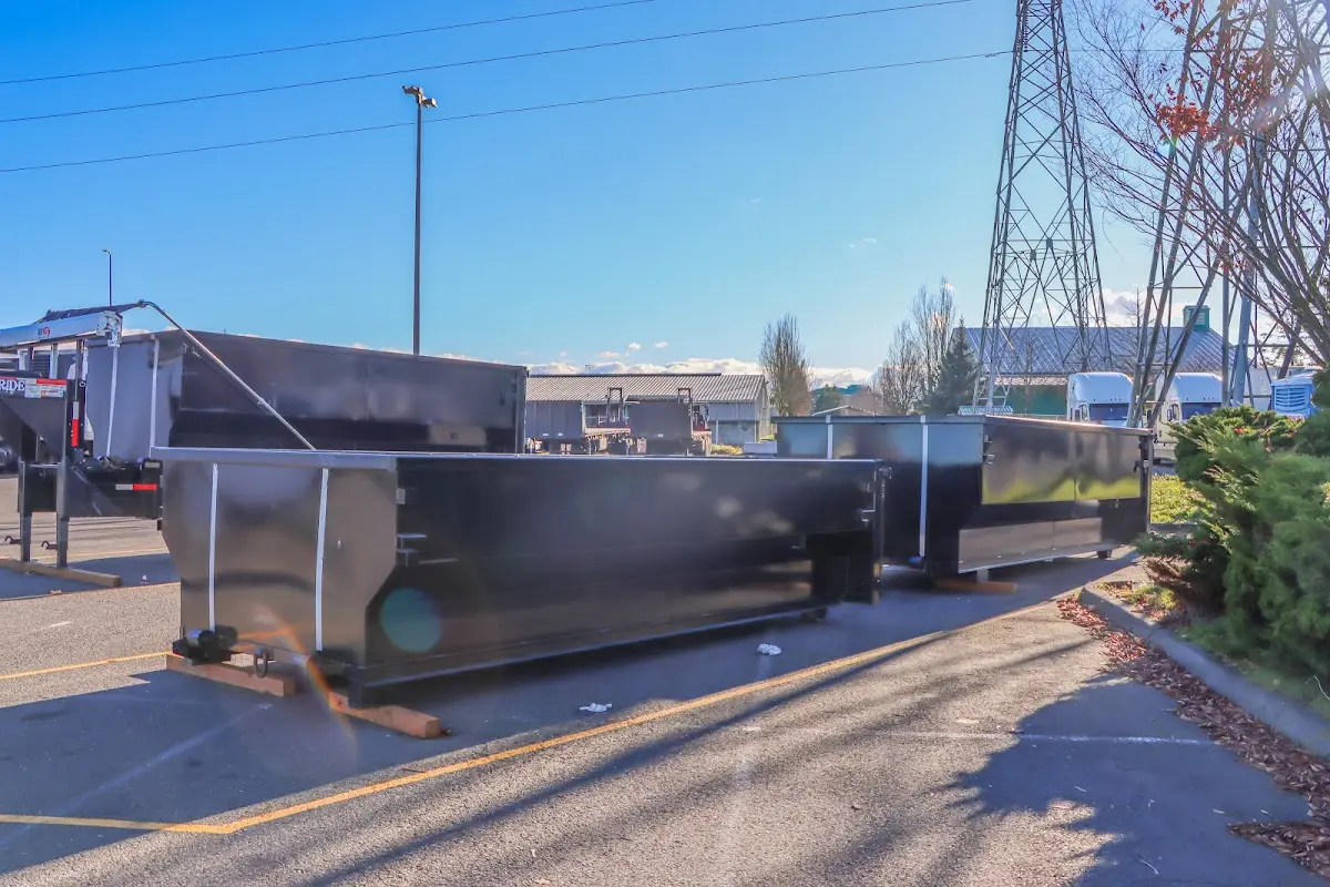 Roll-off dumpster ready for waste disposal at job site for Yard Waste Dumpster Rental in Oak Grove